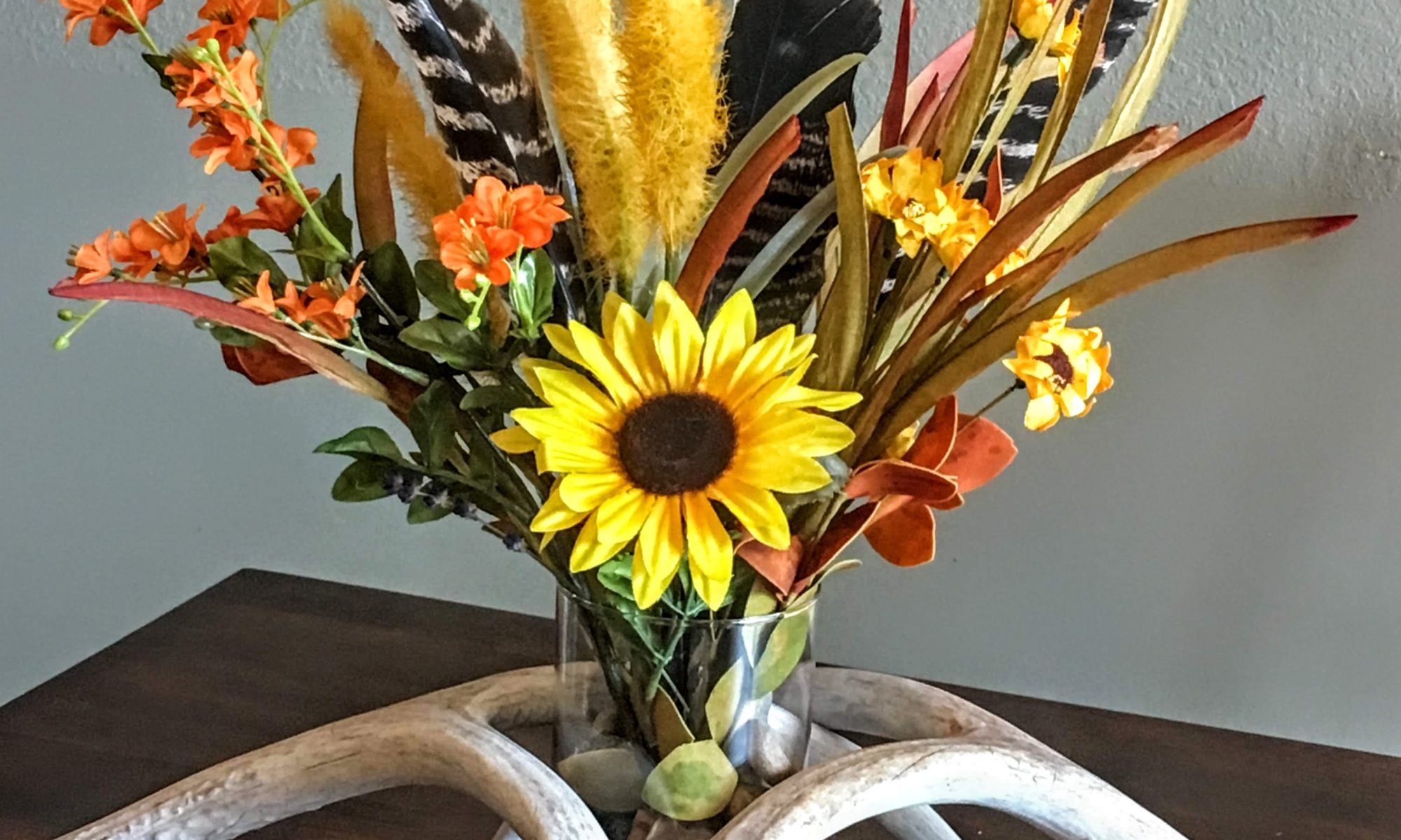 Turkey feather and antler centerpiece